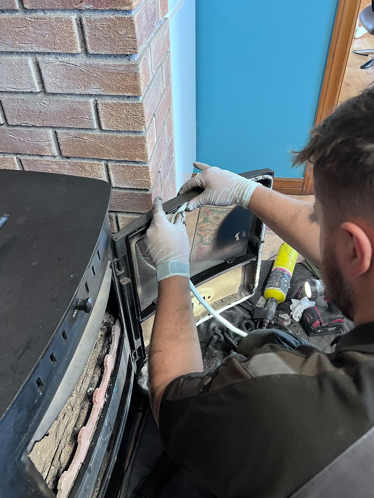 Stove rope replacement in progress